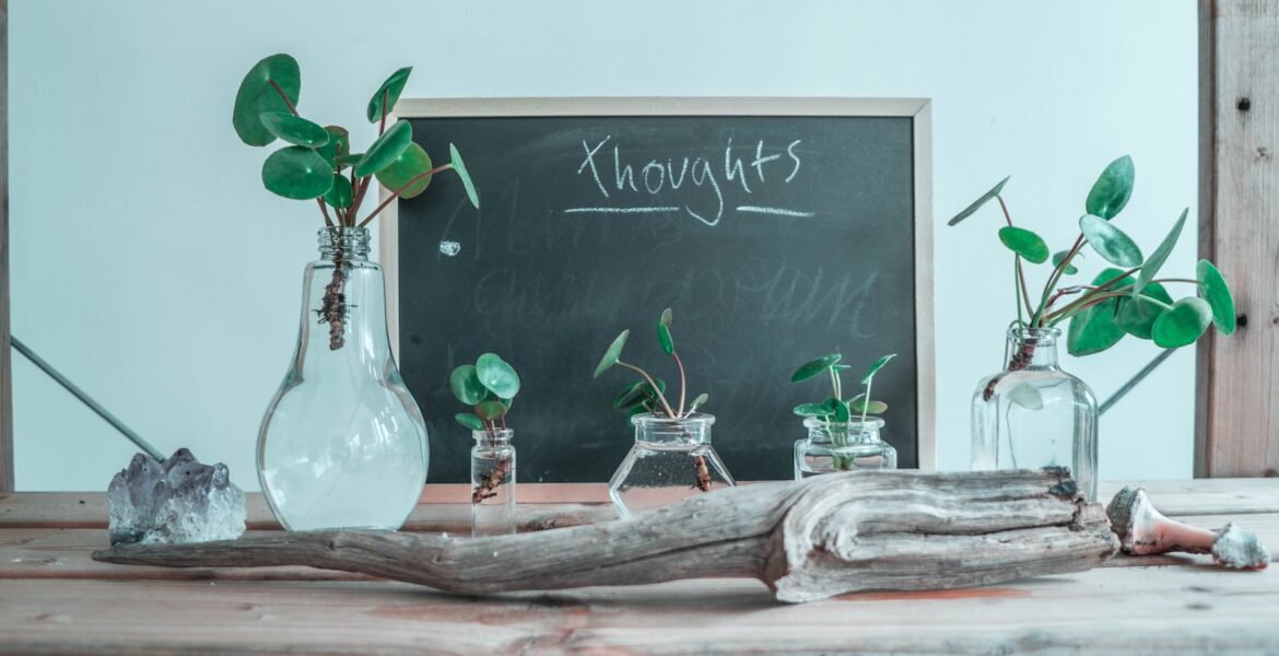 clear glass bottle on table