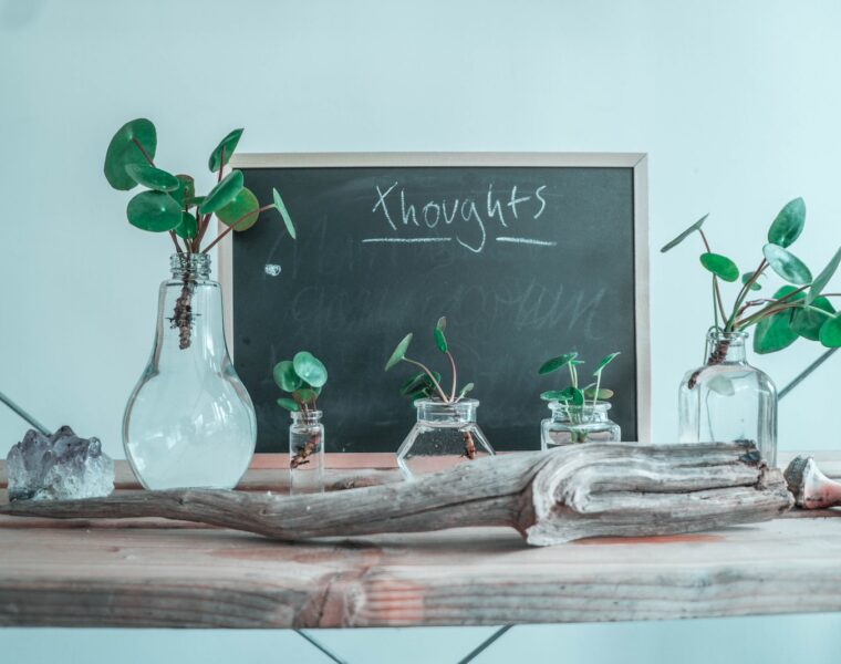 clear glass bottle on table