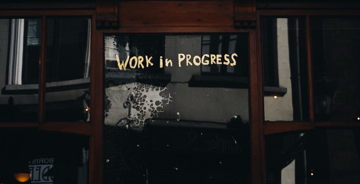 brown wooden cabinet with mirror