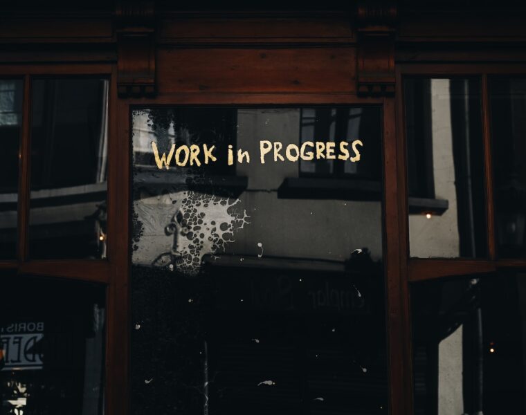 brown wooden cabinet with mirror