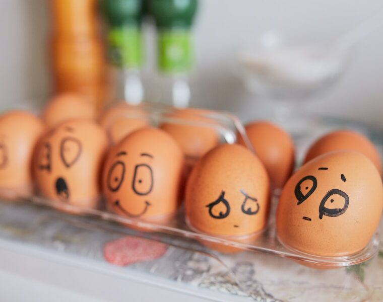 brown eggs on white tray