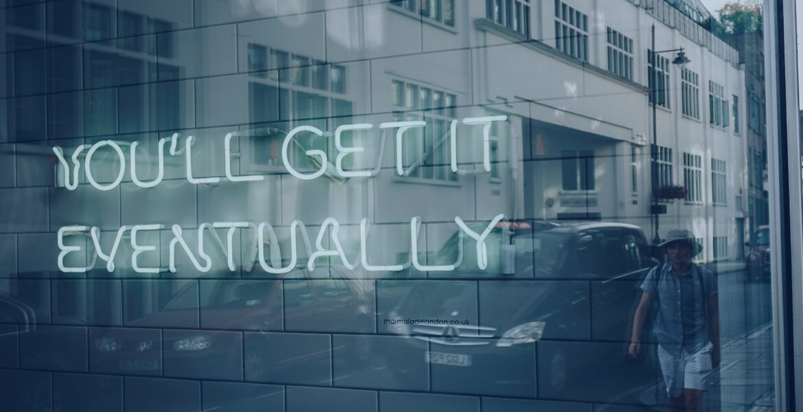 You'll get it eventually neon sign on wall